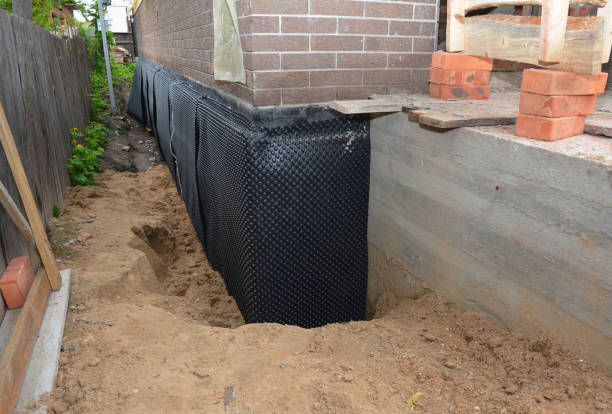 SJ Waterproofing Pros technician performing targeted Basement Waterproofing assessment in Milford, OH